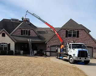 Nortons Roofing team on a residential roof in Bentonville