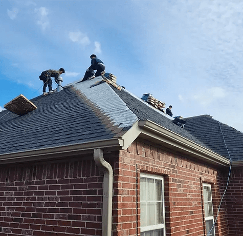 Before and after roof replacement on a Bentonville home