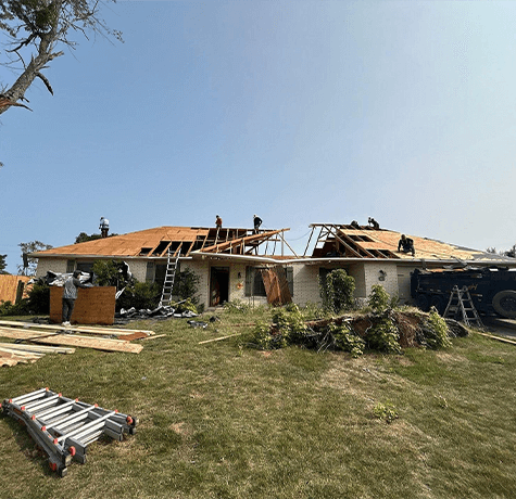 Residential roof repair after storm damage in Bentonville